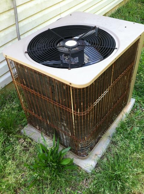 Rust on Grill of Outside Condenser Unit  / Gainesville Georgia Home Inspection